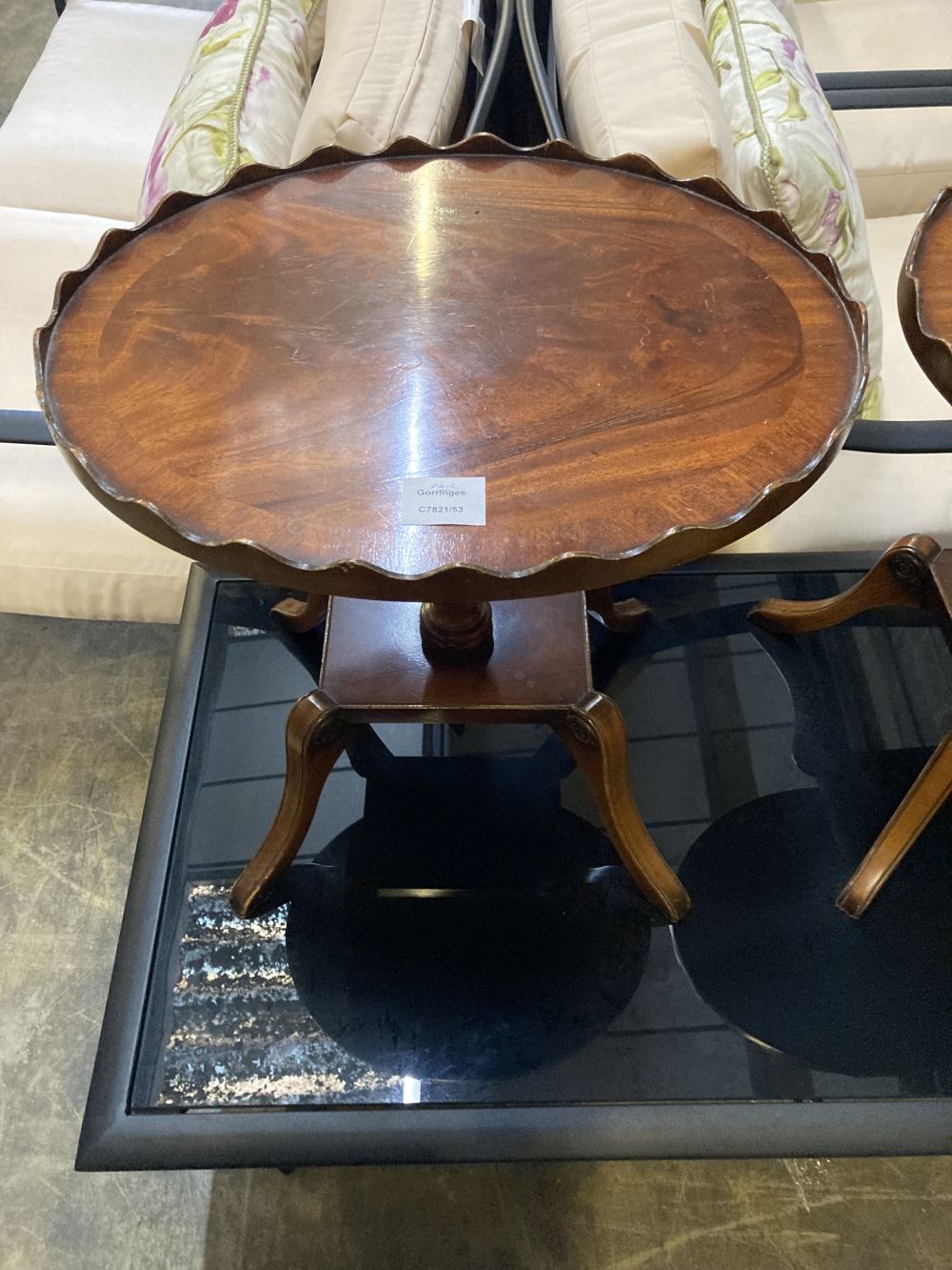 A pair of Regency style mahogany oval galleried wine tables, width 45cm, depth 37cm, height 47cm